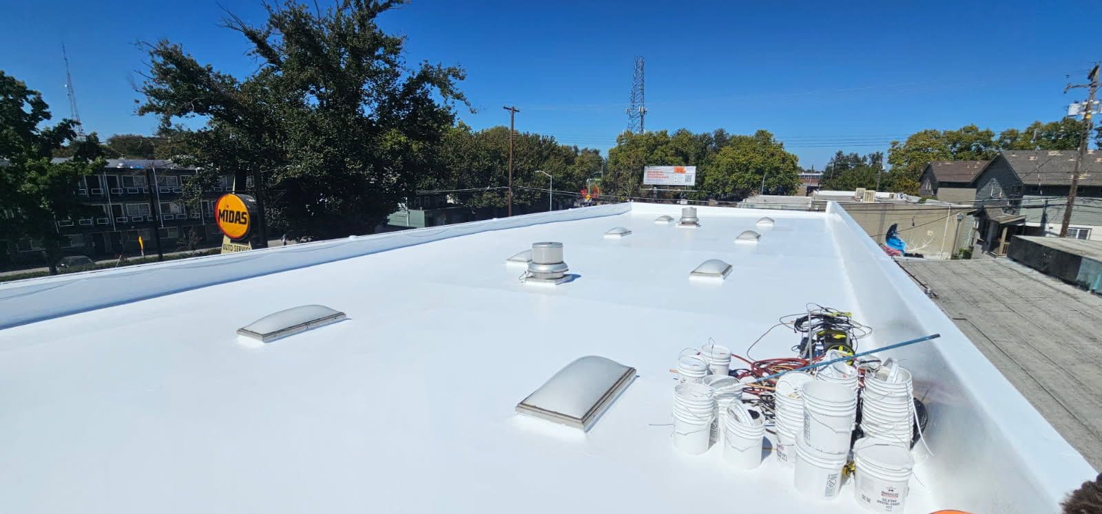 Gallery photos for White Silicone Roof Coating Boosts Longevity: Image #2
