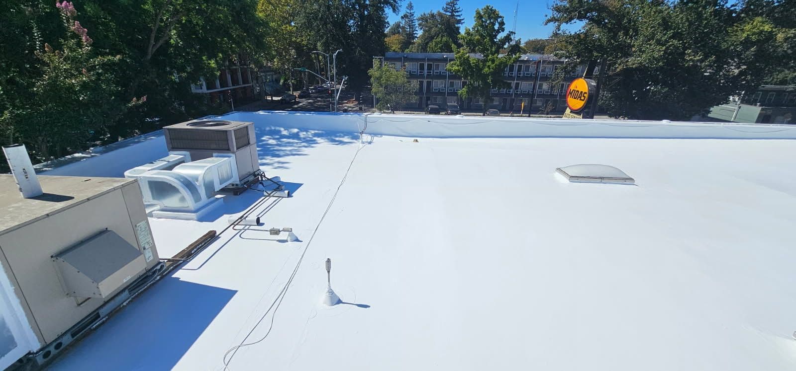 Gallery photos for White Silicone Roof Coating Boosts Longevity: Image #3